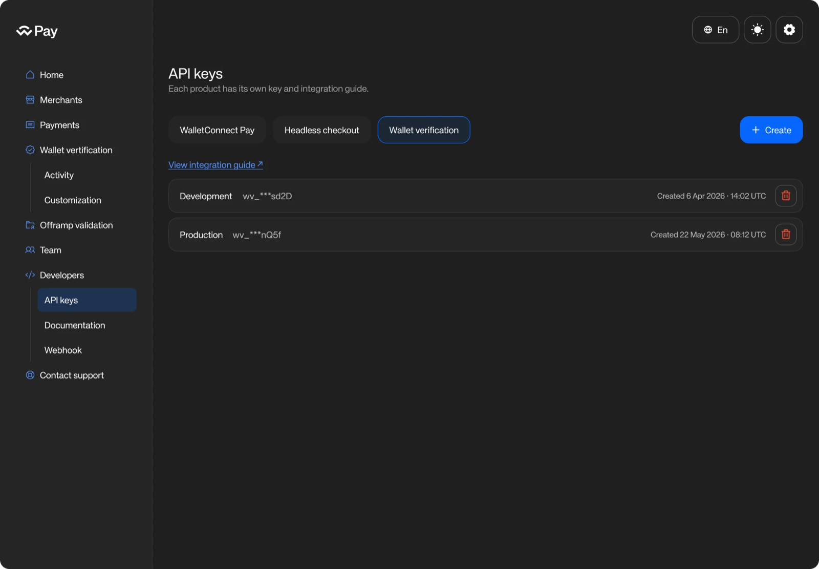 API keys page on the Wallet verification tab, listing two keys with masked values and creation dates